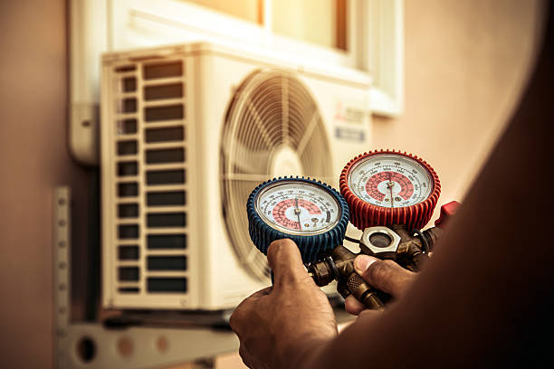 Professional Ac Installation technician working in Burkittsville, MD